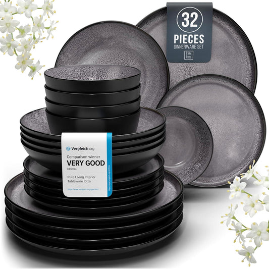Modern dark gray stoneware 32-piece dinnerware set with textured plates and bowls, decorated with white flowers