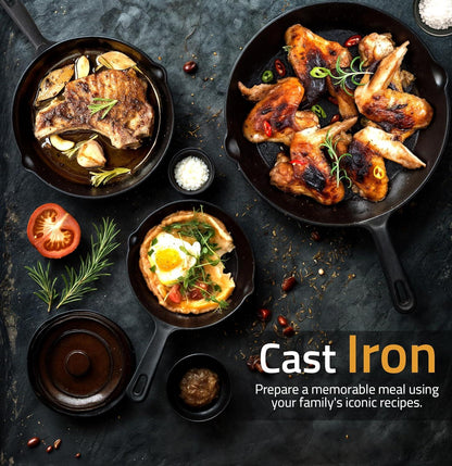 Three cast iron skillets with grilled pork chop, roasted chicken wings, and eggs with herbs on black textured surface