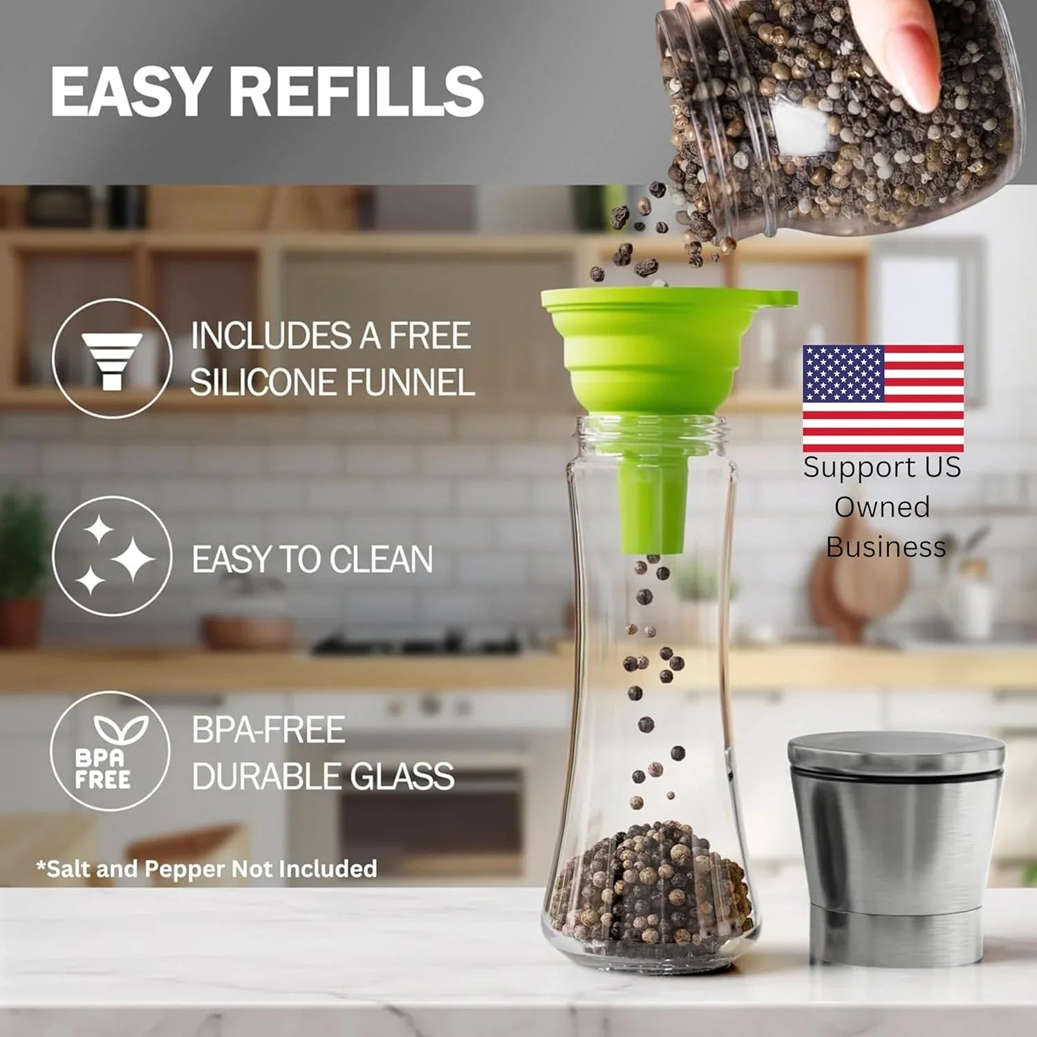 Glass pepper grinder being refilled with black pepper using green silicone funnel in kitchen