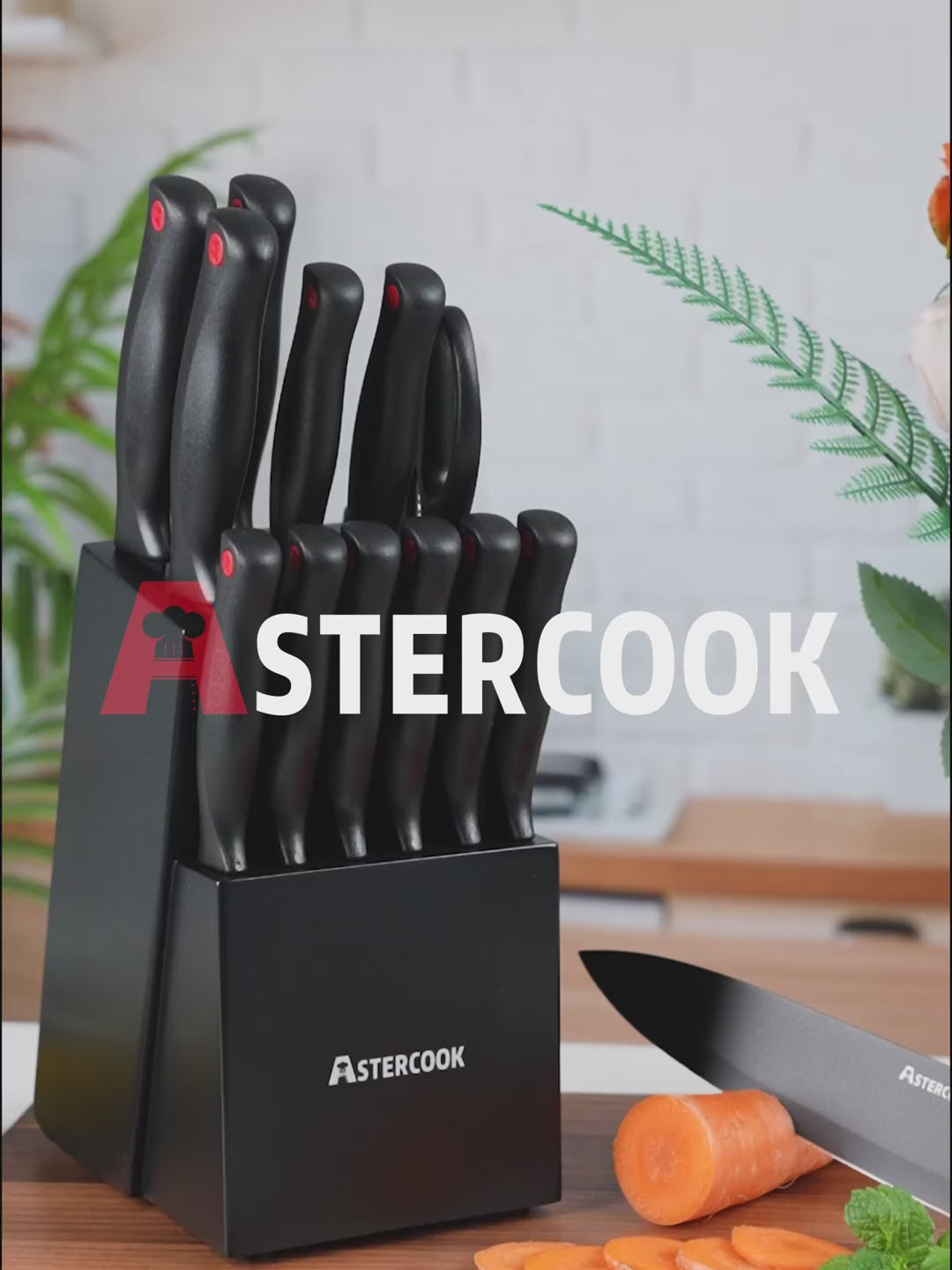 Astercook knife set with black handles and block on a white background