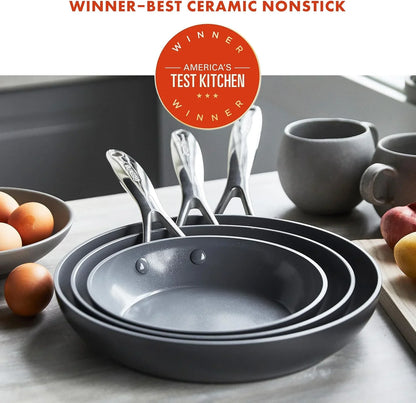 Set of three gray Pro Hard Anodized Ceramic Nonstick frying pans with metal handles on kitchen counter