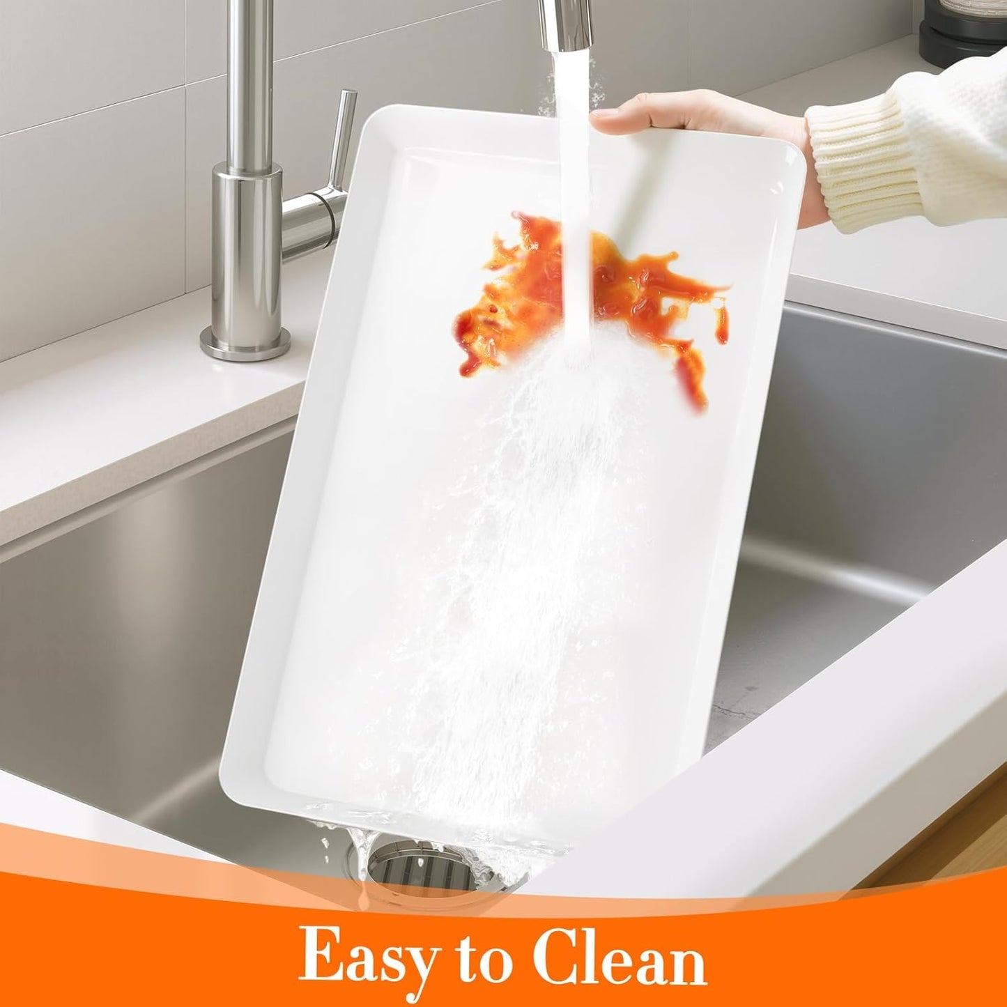 Reusable plastic food platters displayed on a party buffet table with appetizers.