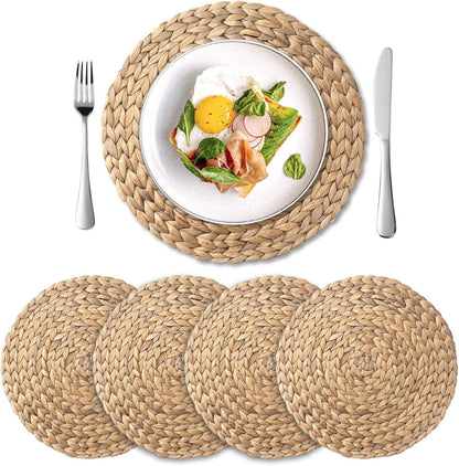 Set of 4 round woven natural water hyacinth placemats with plate of sunny side egg, avocado toast, and prosciutto