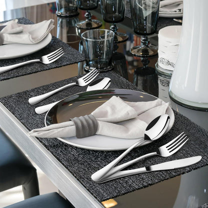 Modern dining table setting with 40-piece heavy duty stainless steel flatware set and gray napkin