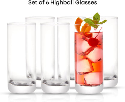 highball glasses filled with mojito cocktails, ice and fresh mint.
