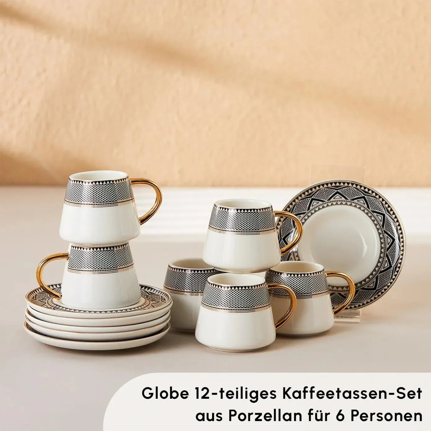 Set of six white porcelain Turkish coffee cups with black geometric bands and gold handles, stacked on matching saucers