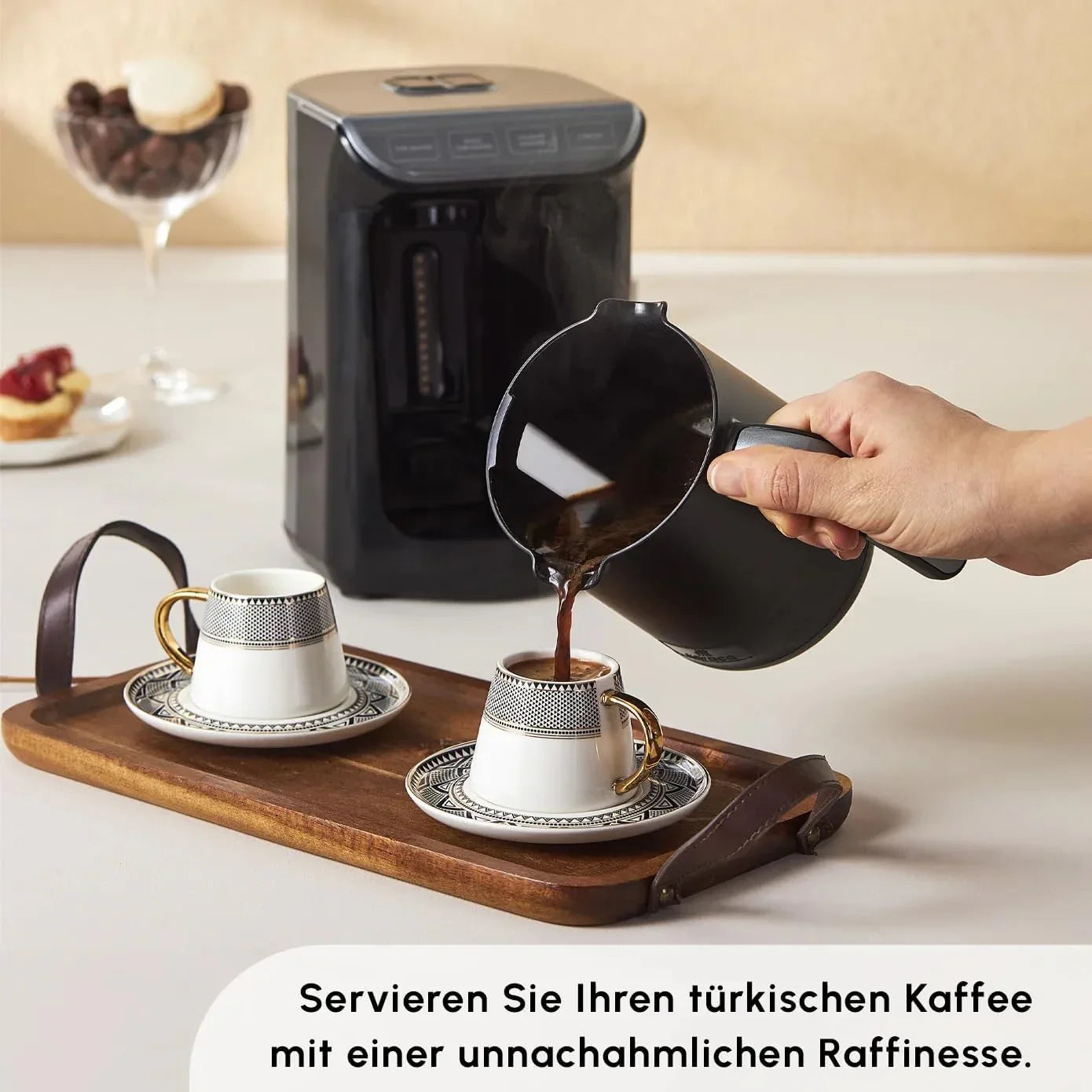 Pouring Turkish coffee into patterned porcelain espresso cups on wooden tray with coffee machine